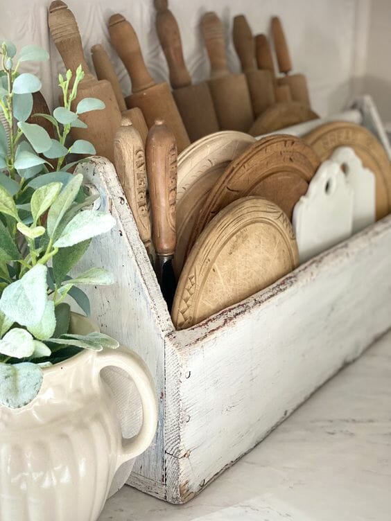 wooden cutting boards inside a vintage toolbox