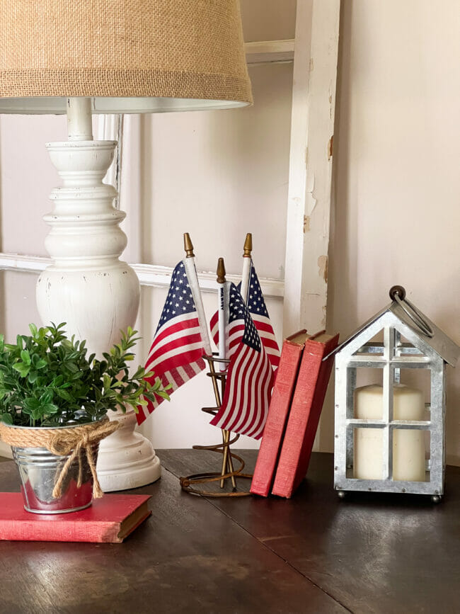 mini flags, books and candle 