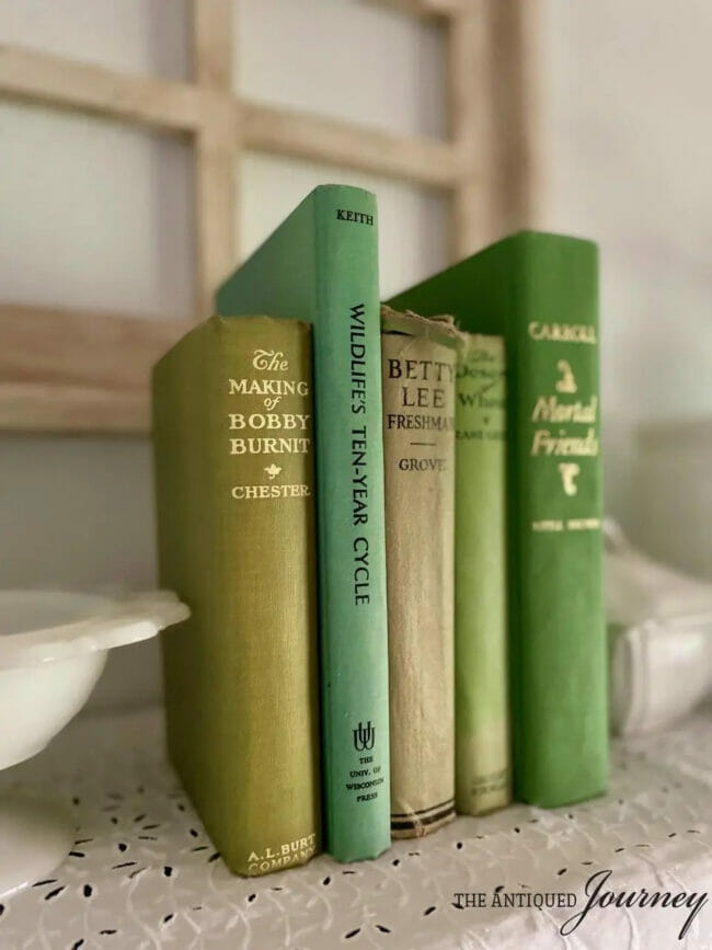 stacked green books