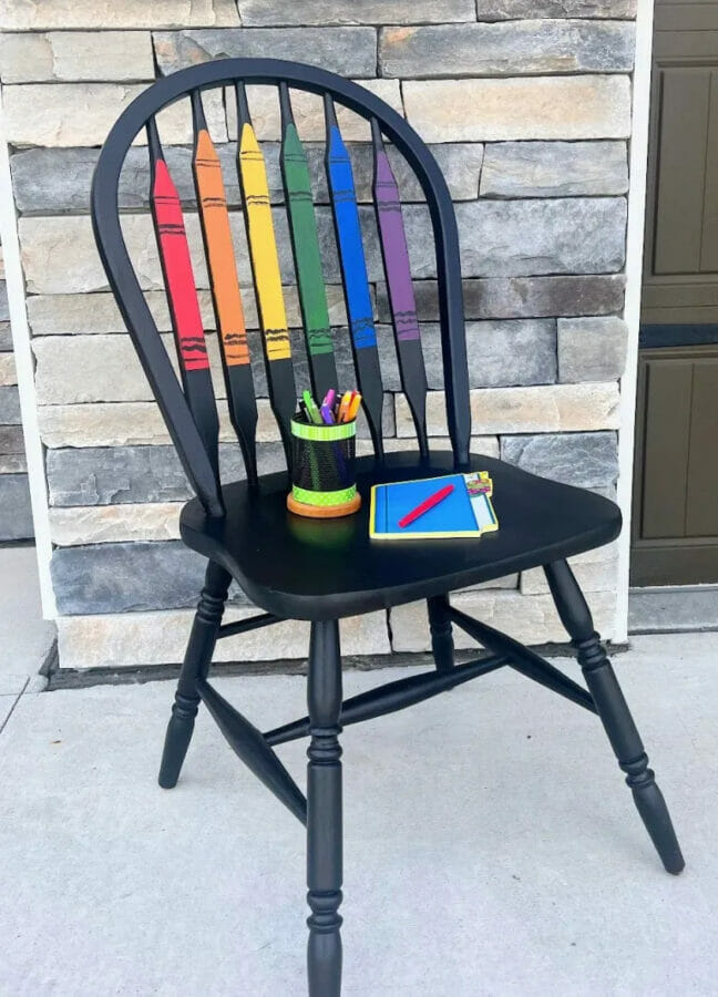 black dining chair with crayon painted back 