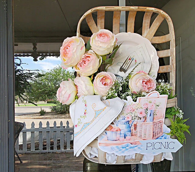 tobacco basket hanging on door with flowers and picnic themed