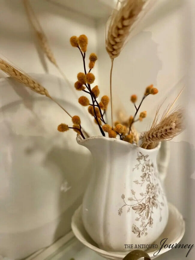 transferware pitcher with fall stems inside