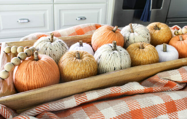 yarn pumpkins in dough bowl