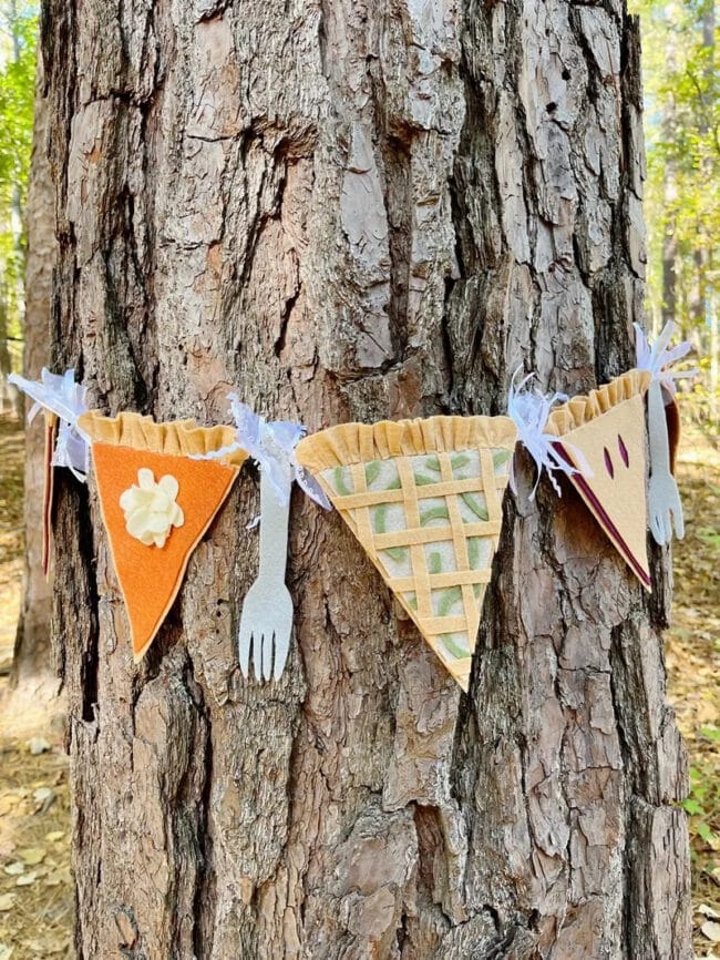 felt pie garland hanging around tree