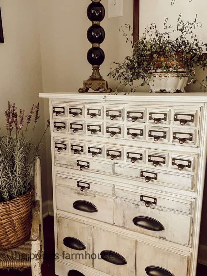 white chest of drawers with label handles