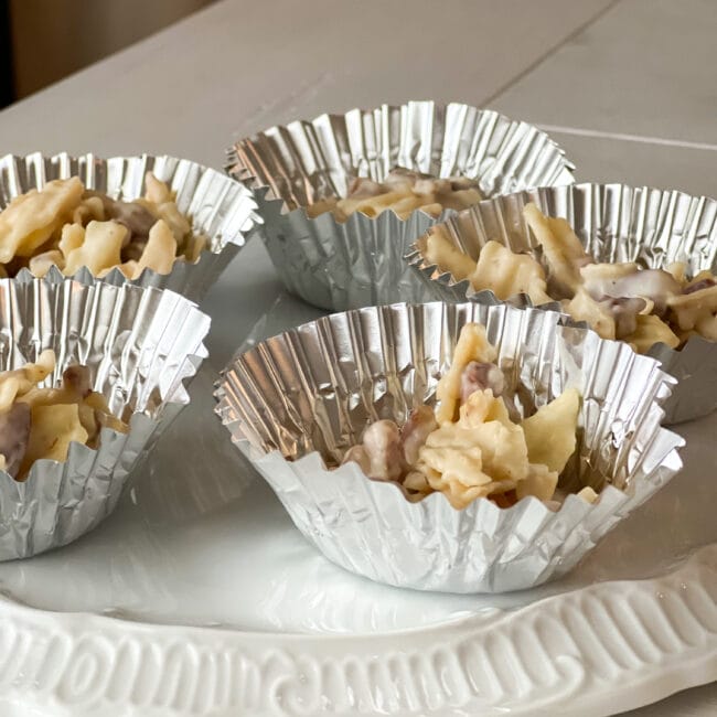 silver cupcake liners with potato chip snack on white platter