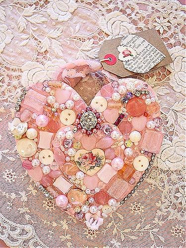 pink heart made from jewelry and buttons