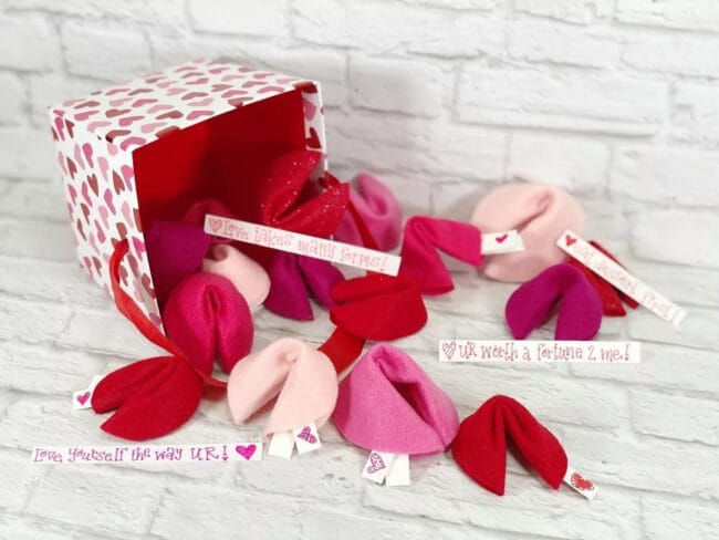 red and pink felt fortune cookies spilling our of a heart box