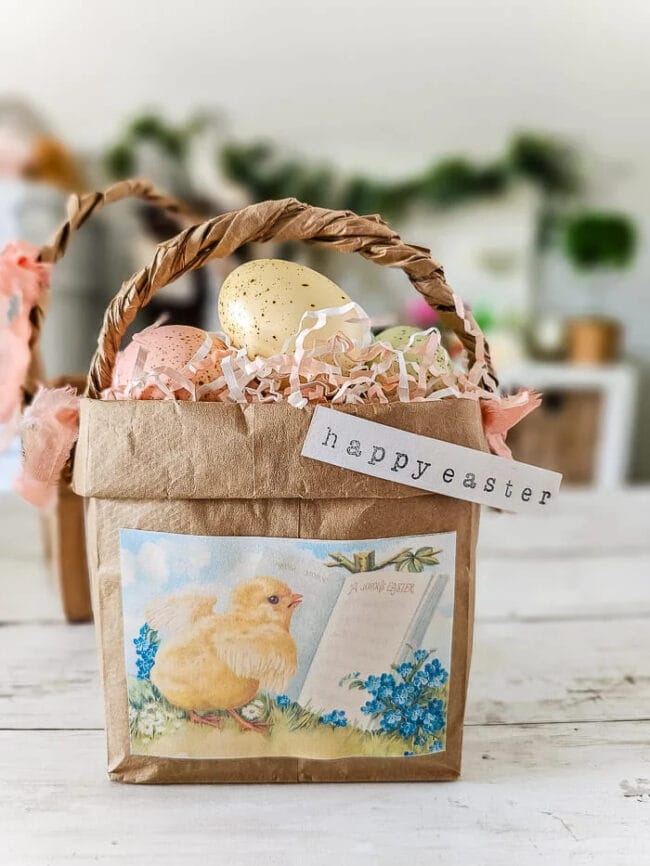 brown bag with handle decorated with eggs and baby chick paper on front