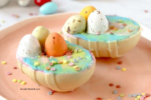 white chocolate eggs cut in half with small easter eggs on top