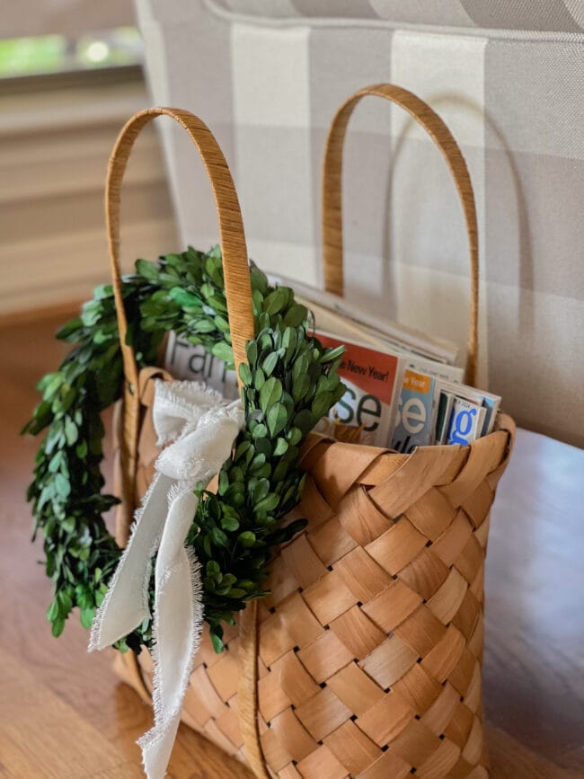magazine basket with green wreath