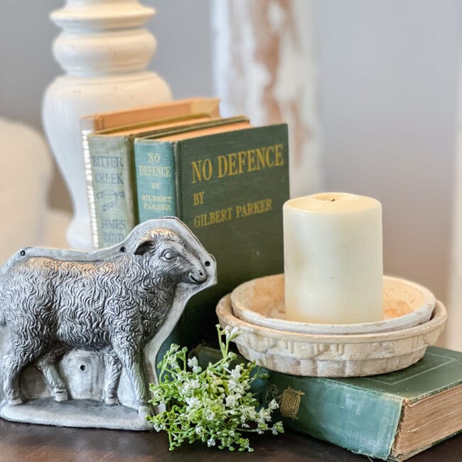 green books with led lamb and candle