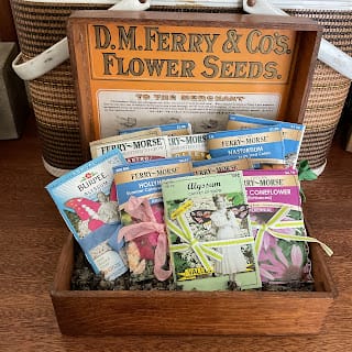 vintage box full of handmade seed packet journals