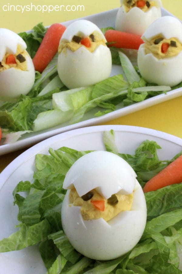 plate with a deviled egg that looks like a chick.