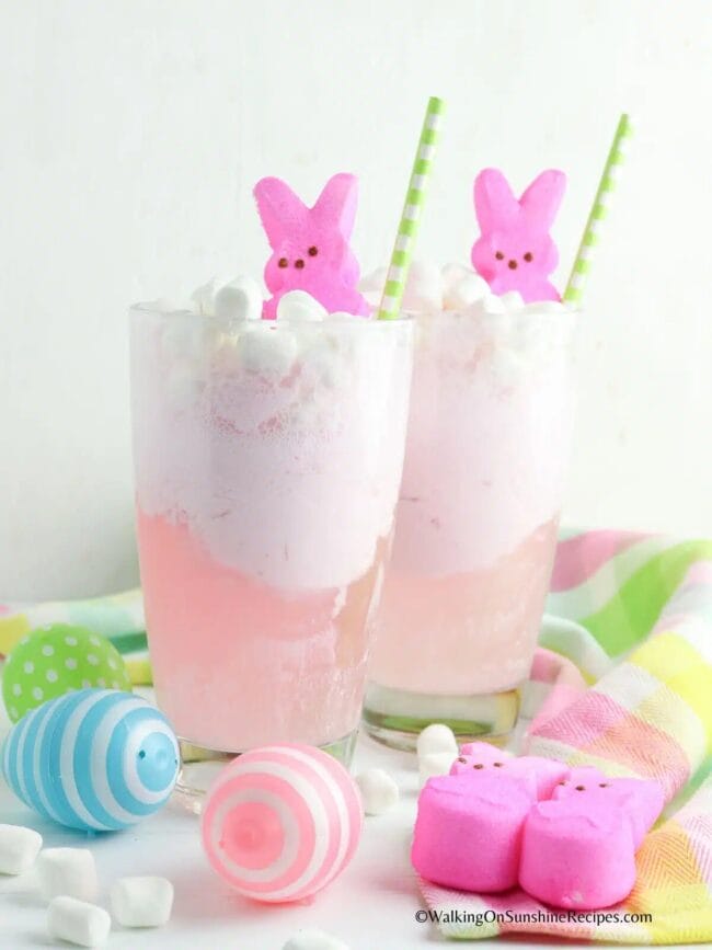 two glasses with pink punch, bunnies on top and straws 