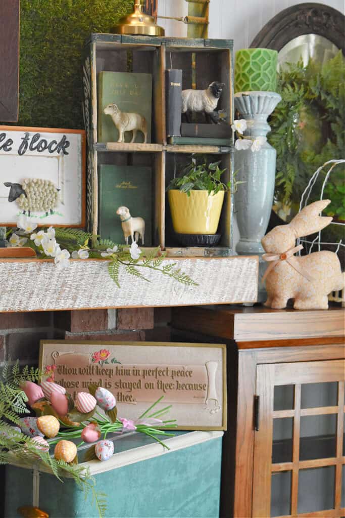 vintage crate full of lamps and greenery and bunnies and homemade flowers 