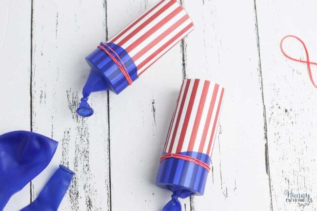 red, white and blue marshmallow shooters