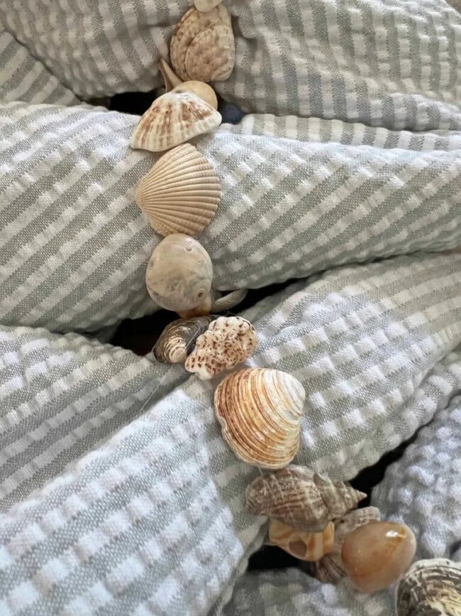 gray seerssucker napkins with homemade shell napkin rings