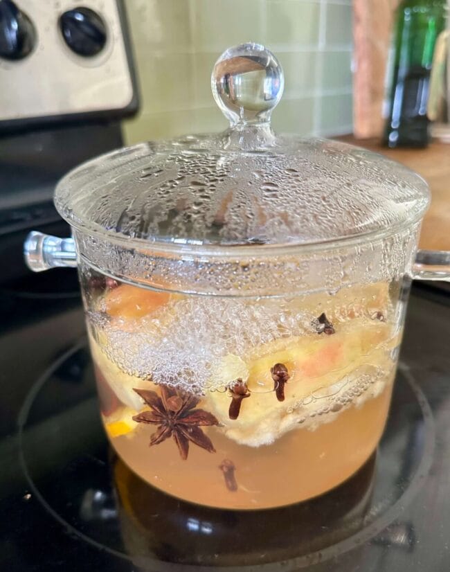 clear pot with simmering fall scents