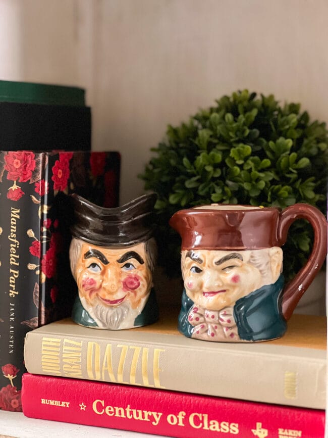 vintage cream and sugar heads of men with funny faces with books