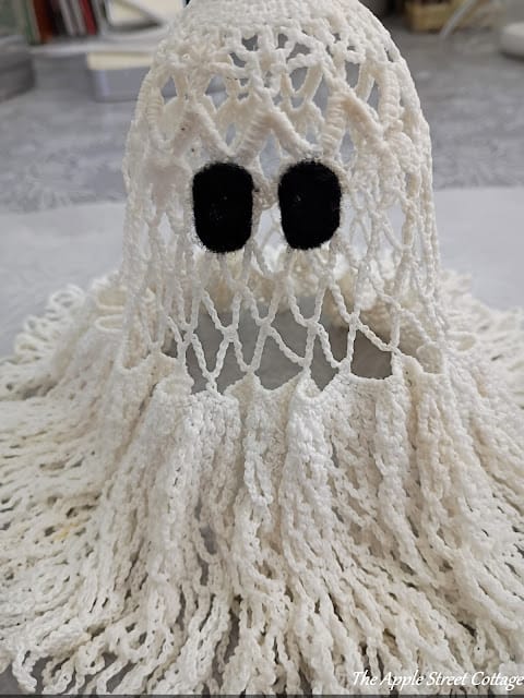 crocheted doily made into a ghost