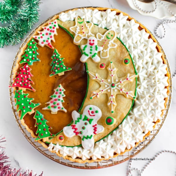 moon shaped pie with Christmas cookies on top