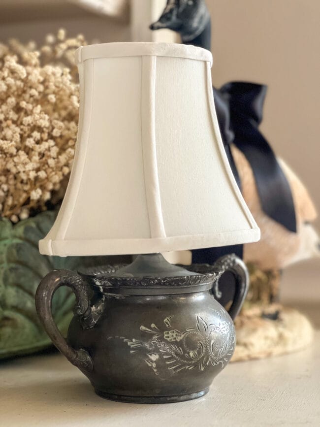 mini silver lamp with a white shade