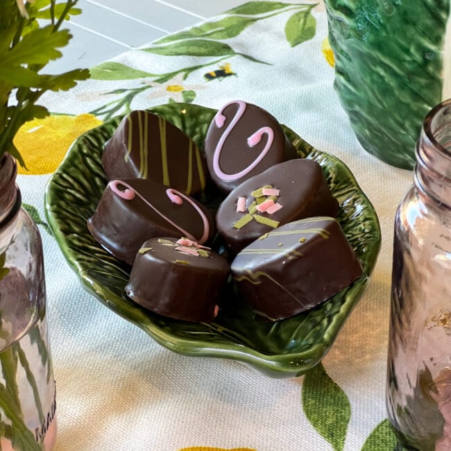 green leaf plate with chocolate eggs