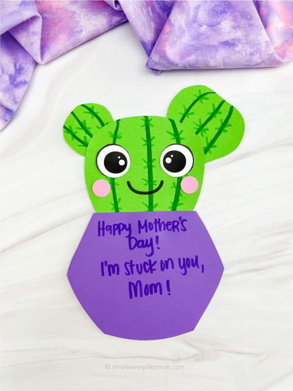 green and purple handmade cactus with a mothers day saying on it