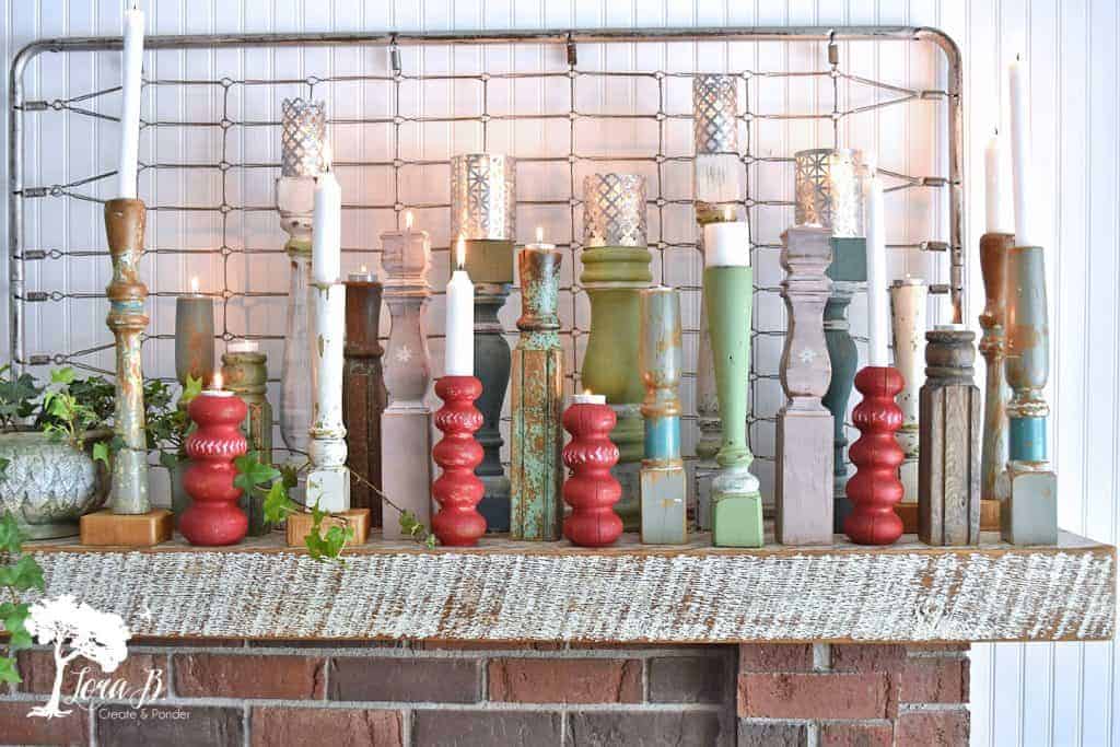 mantel full of old wooden table legs and spindles made into candle holders