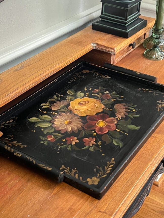 close up of a black tole painted tray