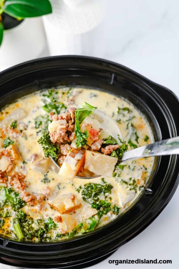 soup in a black crockpot 